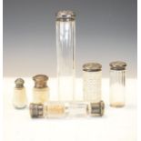 Five late 19th/early 20th Century silver top glass dressing table jars, together with an unmarked