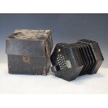 Wheatstone concertina having an ebonised hexagonal case with typical pierced decoration No.22088, in