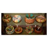 Eight assorted Majolica pottery spittoons, in green, brown and yellow Wheildon' type glazes to