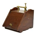 Late Victorian walnut coal scuttle with brass handle together with a brass shovel Condition: