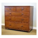 Early 19th Century mahogany chest of two short over three graduated long cockbeaded drawers on bun