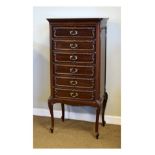 Early 20th Century mahogany music cabinet having six fall front drawers, each with cast foliate