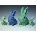 Three Sylvac green glazed bunnies, together with a similar blue glazed figure, 10.5cm - 21.5cm