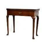 Mid 18th Century walnut and mahogany fold-over top side table with single drawer on club legs with