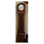 1930's period oak grandmother clock, the silver dial with Arabic numerals, decorative glazed panel