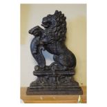 Victorian cast iron doorstop in the form of a seated heraldic lion Condition: