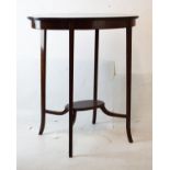 Early 20th Century fiddle back mahogany oval occasional table with undershelf on four splayed square