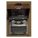 Imperial typewriter in faux crocodile skin case Condition: