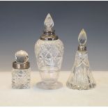 Three early 20th Century glass dressing table jars, each having a silver collar Condition: