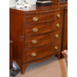 George III mahogany bowfront chest, the top with ebonised banding, fitted brushing slide with four