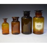 Four amber glass apothecary jars Condition: