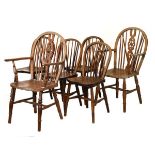 Six (four plus two arm) early 20th Century ash and elm low hoop back Windsor type chairs Condition: