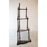 Late Victorian walnut four tier corner what-not Condition: