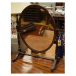 Georgian style mahogany oval swing dressing mirror with turned uprights and stretcher Condition: