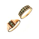 Yellow metal dress ring set green stones, the shank stamped .750, together with a similar ring,