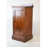 Edwardian mahogany bedside cabinet or pot cupboard with single door enclosing shelf, on plinth