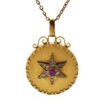 Satin finish yellow metal locket having star decoration in relief set diamonds and central pink