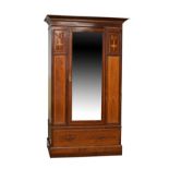 Edwardian inlaid mahogany wardrobe having an inlaid dentil effect cornice over bevelled mirrored