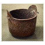 19th Century copper cooking pot, probably Dutch, with foliate scroll decoration to exterior and
