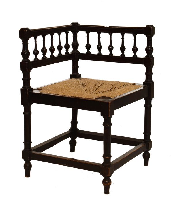 Late 19th Century ebonised string seated corner chair with balustrade on turned supports and plain