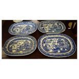 Four 19th Century blue and white transfer printed Willow pattern oval meat dishes Condition: