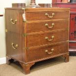 Reproduction mahogany two section military style chest of four long drawers standing on bracket feet