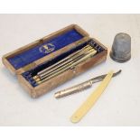 Set of four vintage cut throat razors by Wingfield, Rowbotham & Co, in an oak case, together with