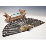 Art Deco teak plate glass book trough, together with a decorative fan Condition: