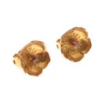 Pair of yellow metal flowerhead clip earrings, each set a pink stone, stamped 9ct, 5.5g approx gross