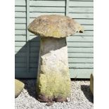 Staddle stone of typical mushroom form on square pedestal support Condition: