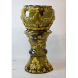 Wardle majolica pottery jardinière and pedestal, each decorated with fruiting swags and masks over
