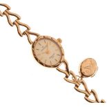 Sovereign - Lady's 9ct gold cased wristwatch with conforming bracelet, 9.5g approx gross Condition: