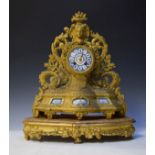 Late 19th Century French gilt spelter and Sevres style porcelain mantel clock, the blue chapter ring