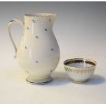 Late 18th/early 19th Century creamware jug having blue painted sprigged decoration, together with