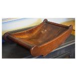 19th Century oak cheese coaster of typical cradle or boat form Condition: