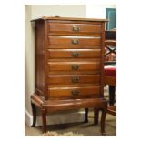 Early 20th Century mahogany music chest fitted six fall front drawers and standing on cabriole