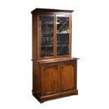 Edwardian mahogany two section bookcase, the upper section fitted four shelves enclosed by a pair of