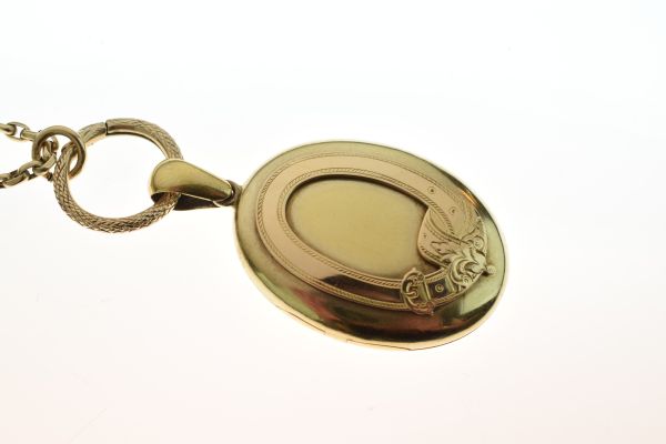 Victorian oval locket, unmarked, with applied garter motif, the glazed interior with styled lock - Image 2 of 7