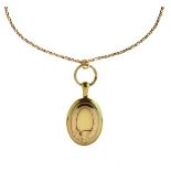 Victorian oval locket, unmarked, with applied garter motif, the glazed interior with styled lock