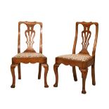 Pair of George II elm and fruitwood dining chairs, each having a yoke top rail with pierced vase