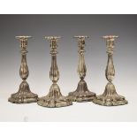 Set of four mid 19th Century Continental white metal candlesticks, probably German, each having a