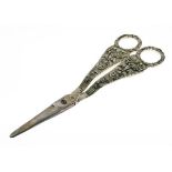 Pair of George III silver grape scissors, the cast handles with shell, lion mask and grape