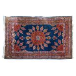 20th Century Indian wool rug, the powder-blue field with central sixteen lobed medallion between