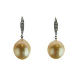 Pair of South Sea golden cultured pearl and diamond drop earrings, stamped '750' to the white