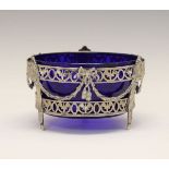 18th Century Dutch silver and glass bowl standing on four fluted supports conjoined by ribbon and