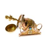 Early 19th Century gold trinket in the form of a cannon, the spring mechanism opening to reveal a