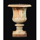 Late 19th Century cast iron garden urn of campana form with fluted upper body and reeded lower