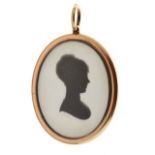 Silhouette locket back pendant, the female profile signed Miers below the bust line, the reverse