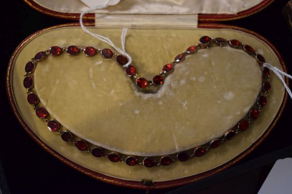 Garnet riviere necklace, the thirty-eight uniform oval cuts in closed back setting, approximately - Image 6 of 6