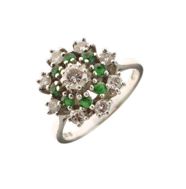 Diamond and emerald 18ct white gold cluster ring, the principal brilliant cut of approximately 0.2